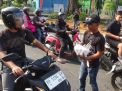Udara Mulai Berasap: IJTI Pengda Jambi dan Adya Group Bagikan Ribuan Masker Gratis