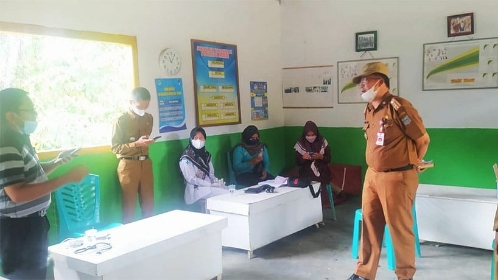 Jubir Satgas Covid-19 Merangin saat turun ke Desa Tanjung Benuang Kecamtan Pamenang Selatan