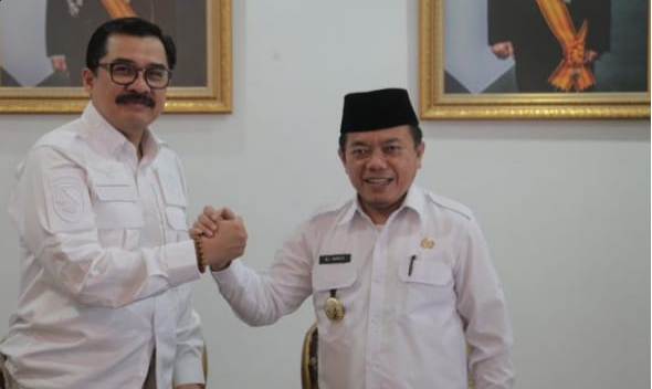 Kabinda Jambi, Brigjen Pol David Syah bersama Bupati Merangin, Al Haris