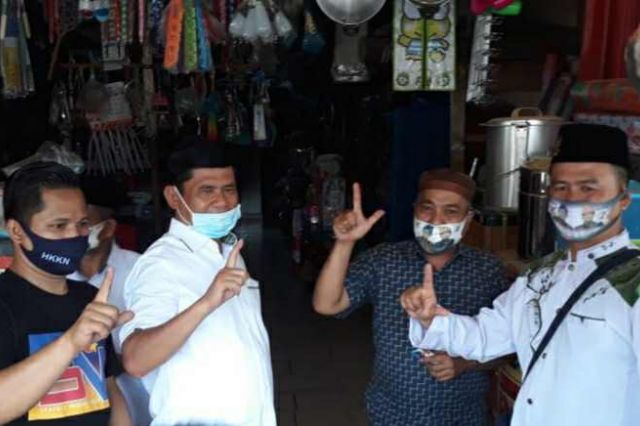 Blusukan di Pasar Tebing Tinggi Sambil Bagikan Masker, Pedagang Puji Syafril Nursal