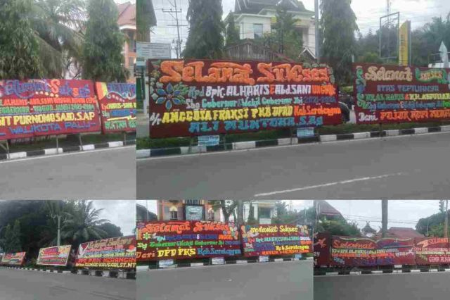 Sepanjang Jalan Posko Koalisi Haris-Sani Dipenuhi Karangan Bunga