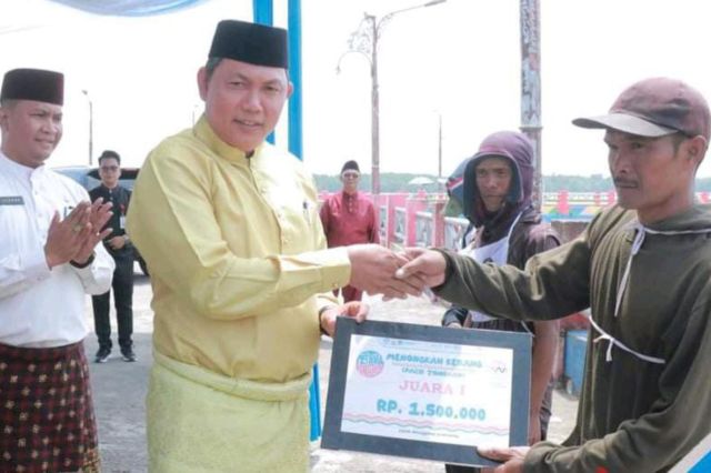 Wabup Hairan Buka Secara Resmi Lomba Pacu Tongkah di Kuala Tungkal