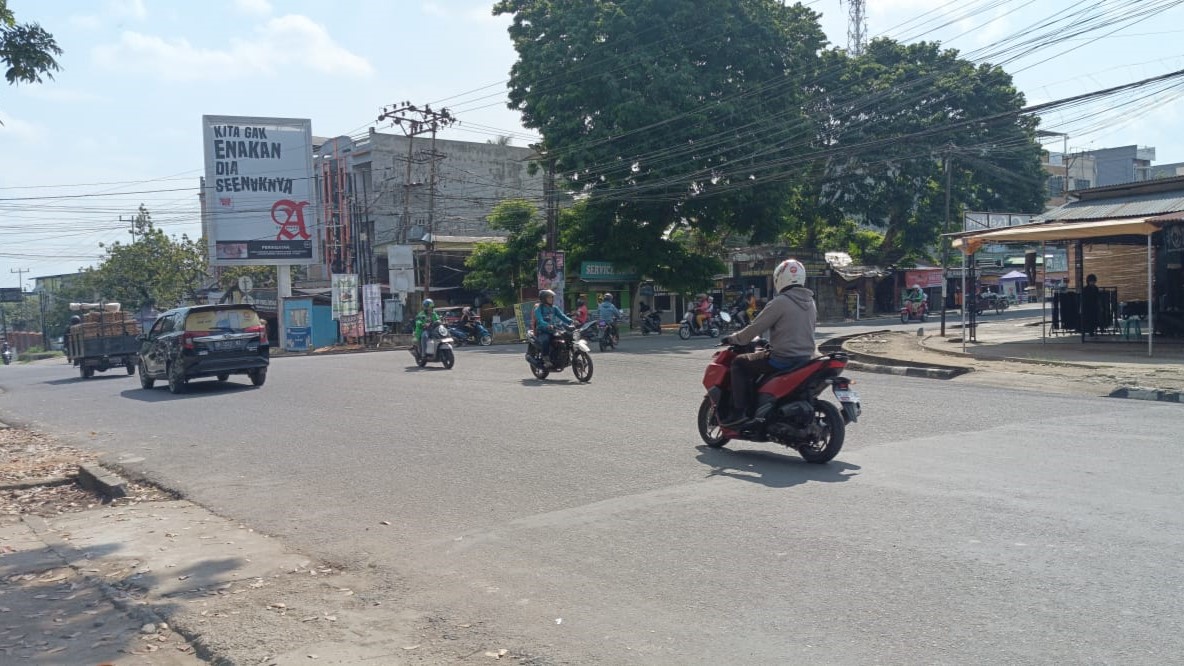 Tips aman berkendara di persimpangan jalan